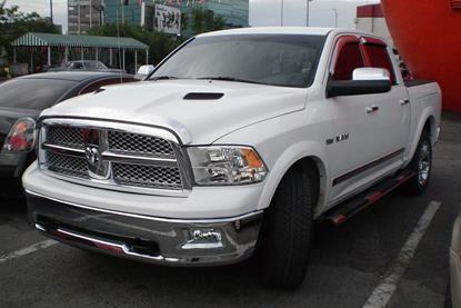 '09_Dodge_Ram_1500_Crew_Cab_(Orange_Julep_'10).jpg